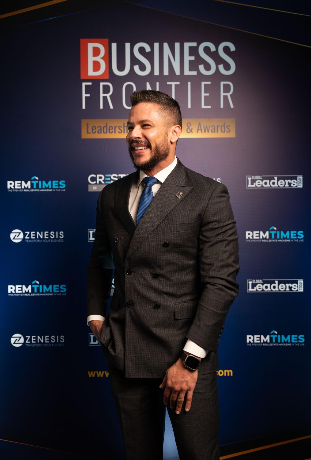 Andrew at an awards backdrop